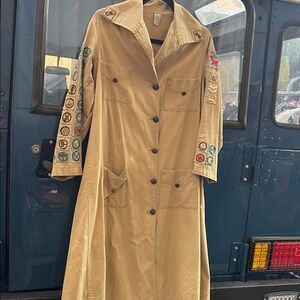 Girl scout trench with all the patches
